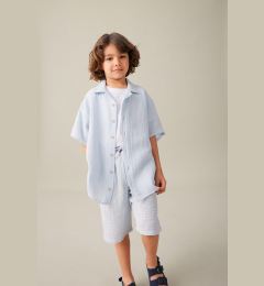 Снимка на DEFACTO Boy's Oversize Fit Polo Neck Muslin Short Sleeve Shirt