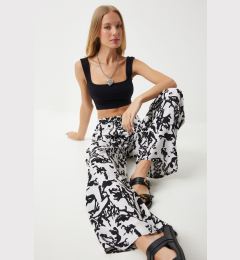 Снимка на Happiness İstanbul Women's White Vibrant Black Patterned Loose Viscose Palazzo Trousers