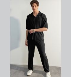 Снимка на Trendyol Limited Edition Black / Wide Leg Textured Wrinkle-Free Hidden Drawstring One Piece Sweatpants