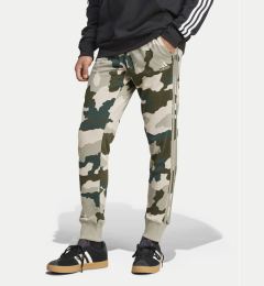 Снимка на adidas Долнище анцуг Seasonal Essentials Camouflage IV7384 Зелен Regular Fit